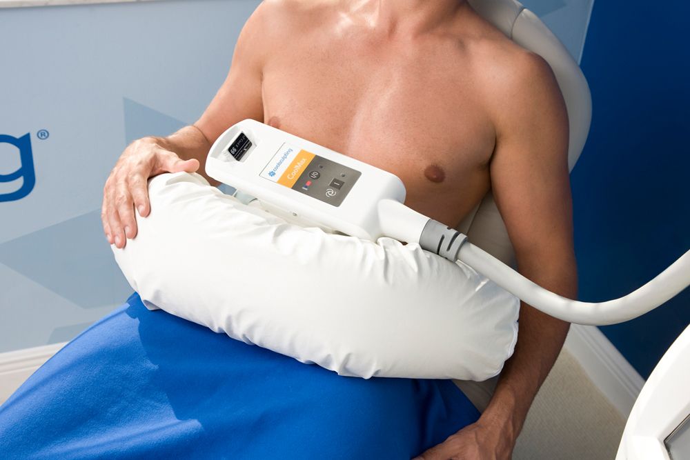 Man undergoing CoolSculpting treatment